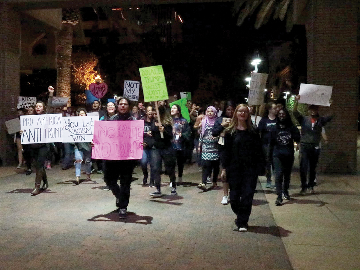 Protesters marched through streets of downtown Riverside in response to Donald Trump's election. (Faraz Rizvi/HIGHLANDER)