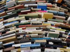 1280px-A_tower_of_used_books_-_8443.wikimediacommons