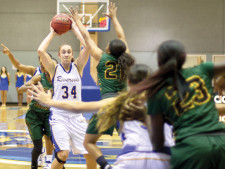 Clemence Lefebvre (No. 34) looks for an open teammate to pass the ball to.