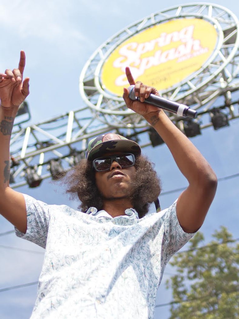Rapper Ab-Soul opens Spring Splash by telling the audience to raise their hands