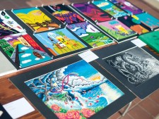Student drawings and paintings lay out for display at last week’s Art Walk