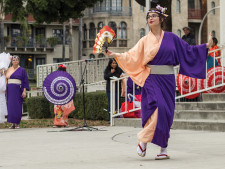 A dance group displays some ethnic dances, inspired by Asian cultures.
