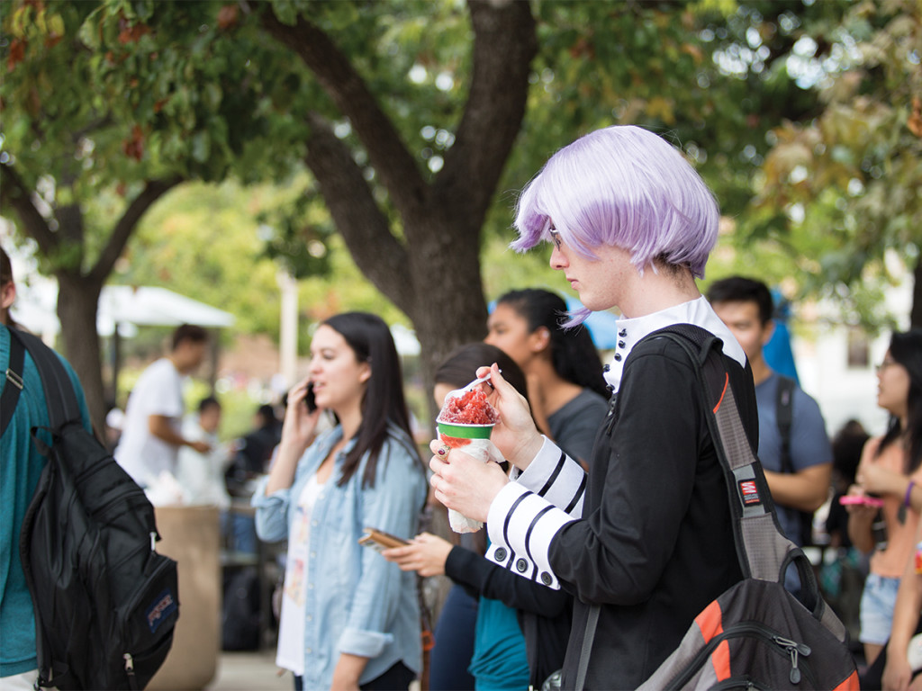 Students wear their Halloween costumes to match the theme of the food truck festival - “Trick or Treat”.