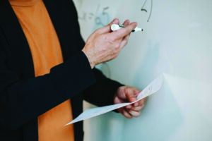 professor with a white board